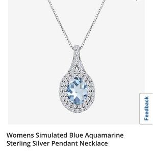 Aquamarine sterling silver pendant necklace and matching earrings.